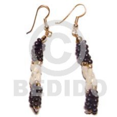 Dangling twisted troca rice beads Dangling twisted troca rice beads