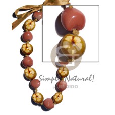 Kukui nuts in painted graduated Kukui nuts in painted graduated