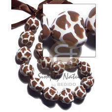 Kukui seeds in animal print Kukui seeds in animal print