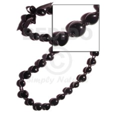 Black kukui nuts ribbon lei Black kukui nuts ribbon lei