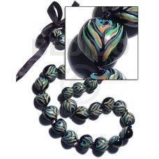 Kukui seeds in animal print