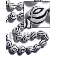 Kukui seeds in animal print