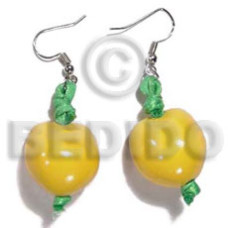 Dangling yellow kukui nuts