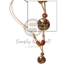 Round cowrie shell pendant